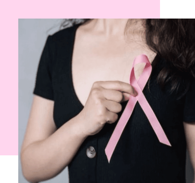 A woman holding onto a pink ribbon